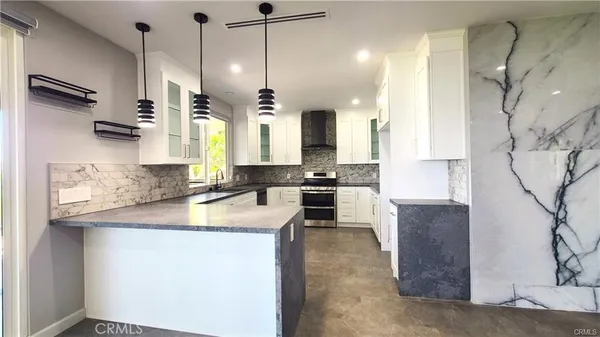 a bathroom with a shower and toilet