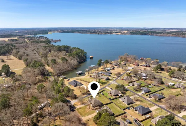 a view of a terrace with a lake view