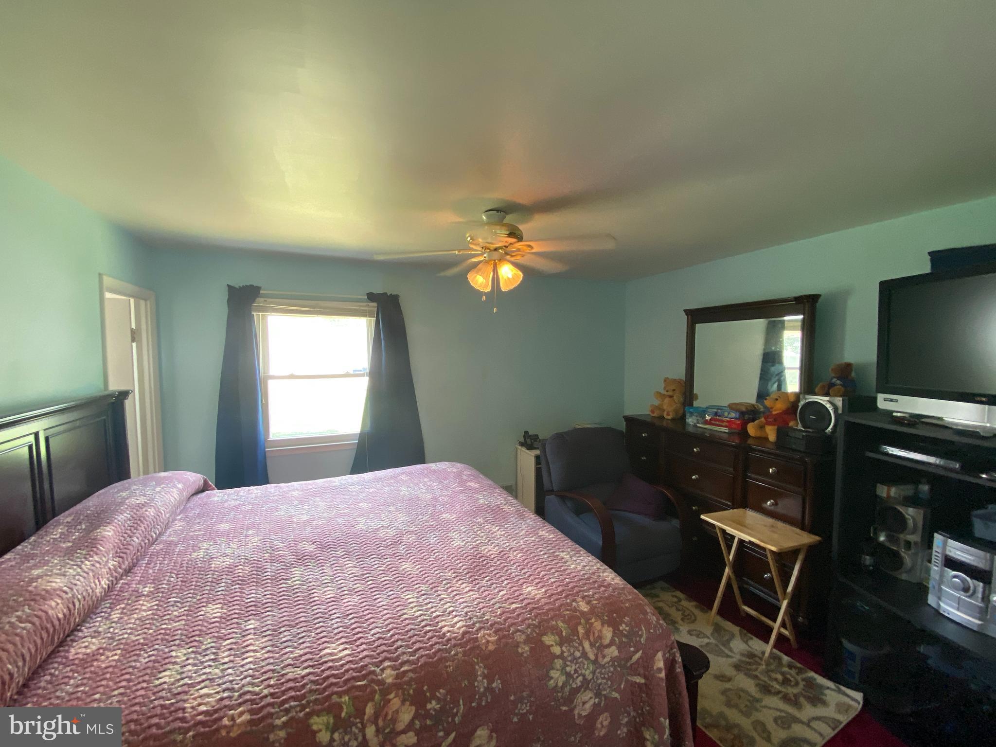6102 Spell Road Clinton, MD 20735 - Photo 18 of 34 Master Bedroom with Immaculate Hardwood Floors
