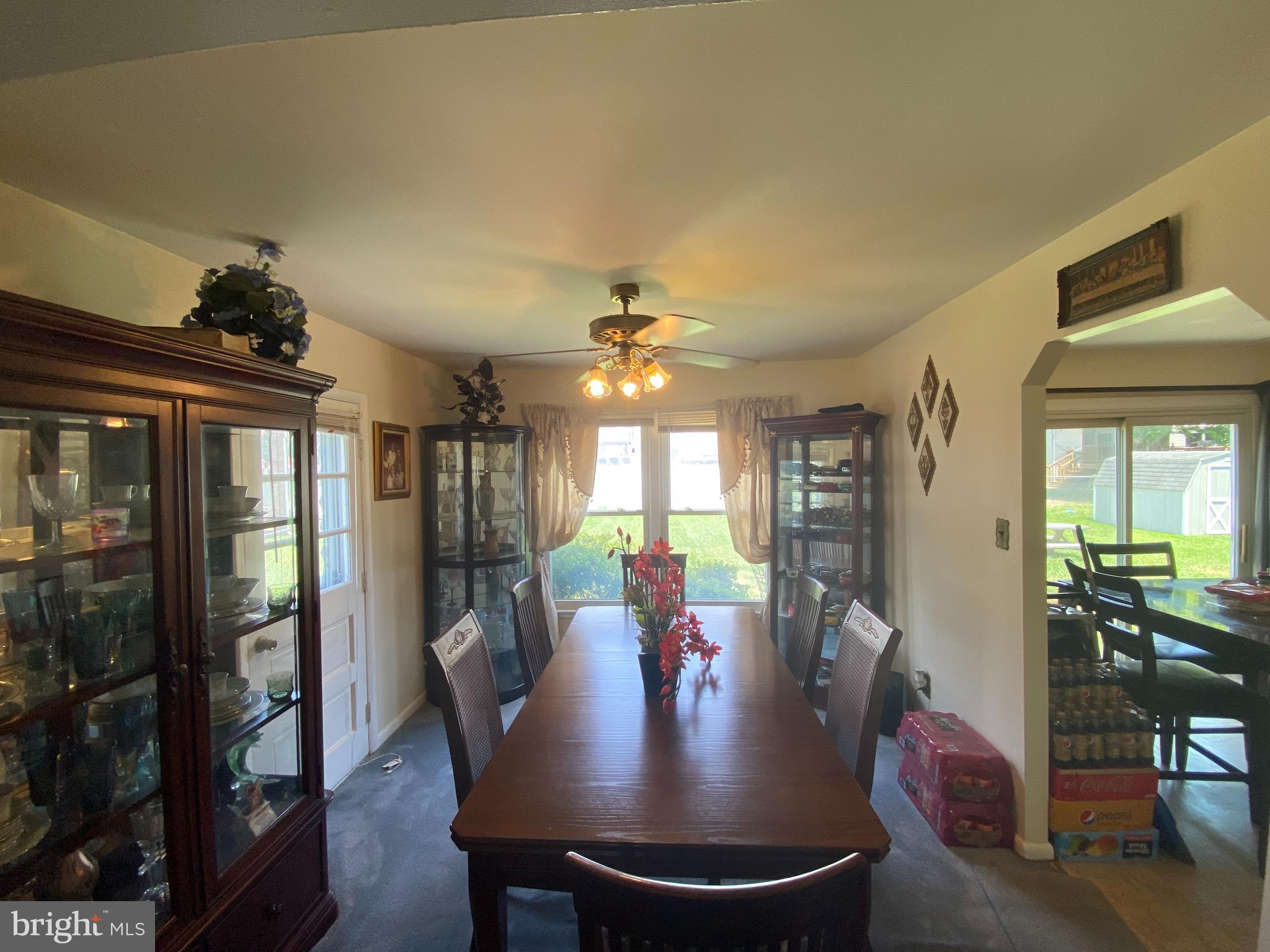 6102 Spell Road Clinton, MD 20735 - Photo 8 of 34 Dining Room with Immaculate Hardwood Floors