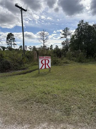 a sign board with ocean view