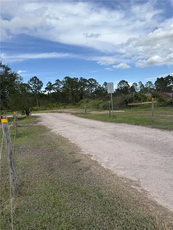 a view of lake with green space