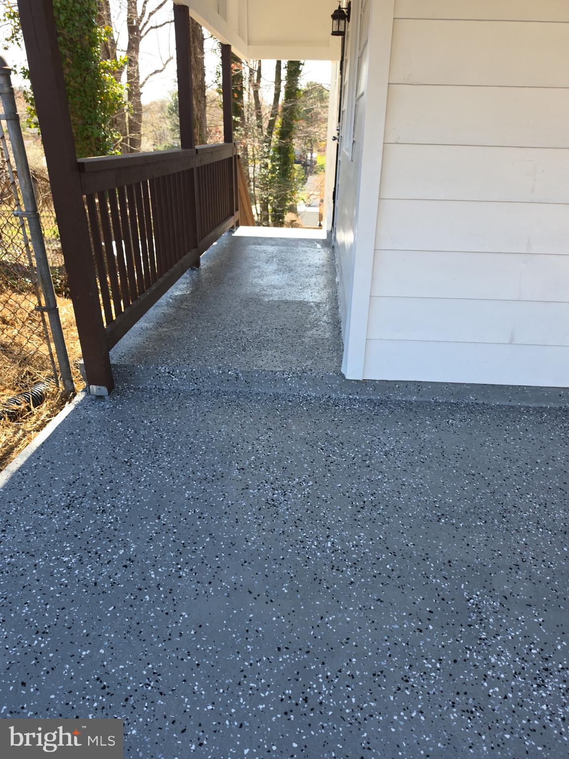 6107 Buckler Road Clinton, MD 20735 - Photo 37 of 45 a view of porch with wooden floor