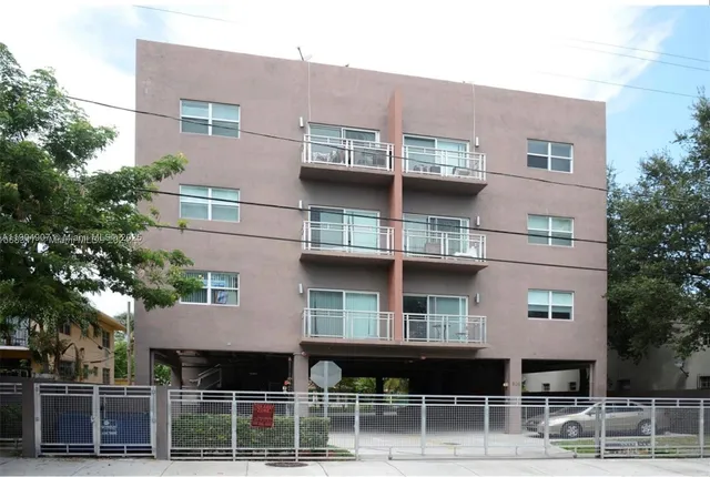 a front view of a building with balcony
