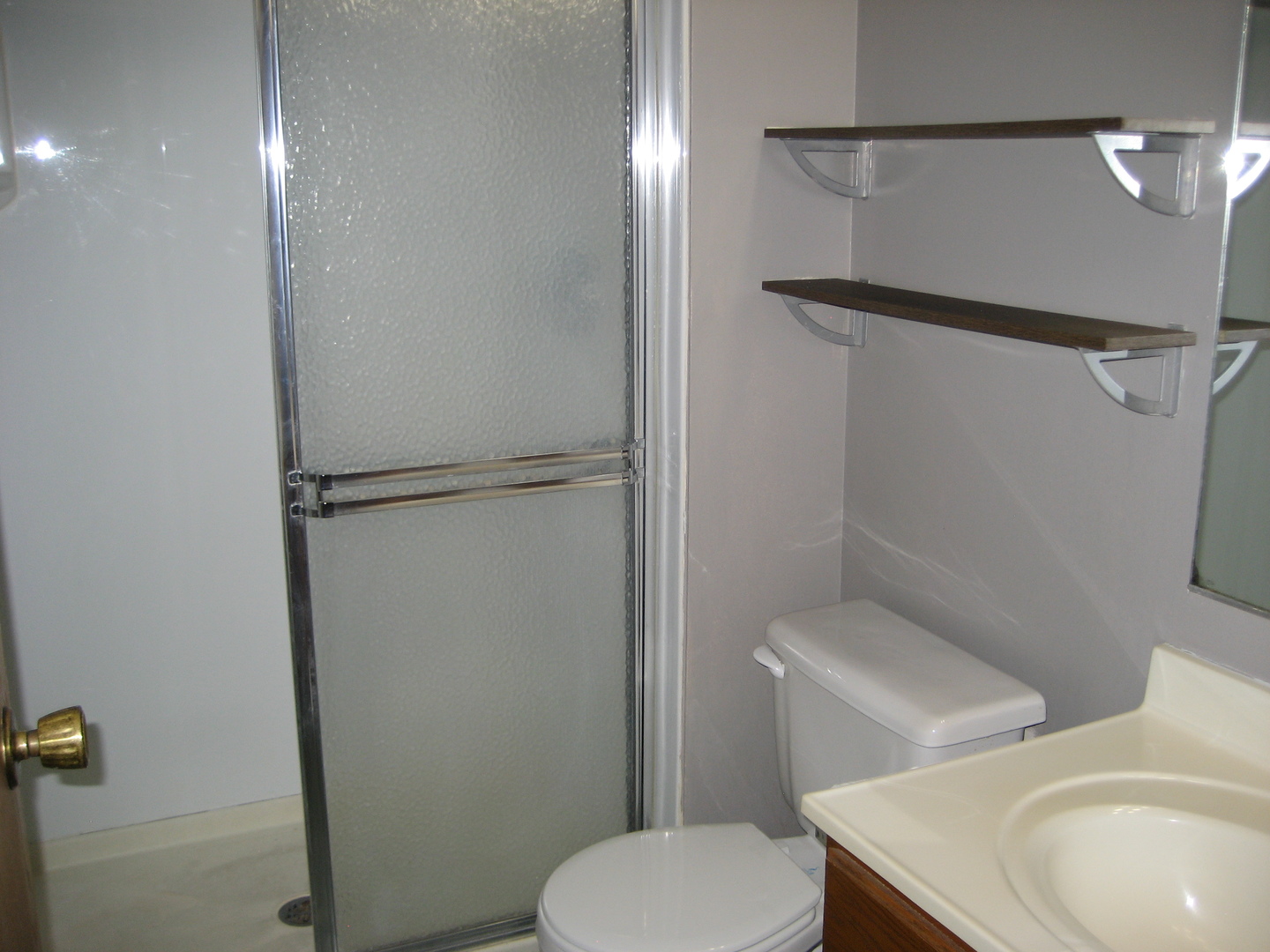 294 Le Parc Circle Buffalo Grove, IL 60089 - Photo 16 of 24 a white toilet sitting next to a bathroom sink