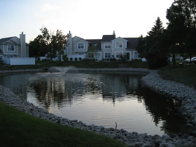 a view of a lake with a house