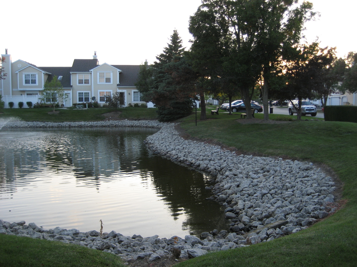 294 Le Parc Circle Buffalo Grove, IL 60089 - Photo 24 of 24 a view of a lake with a house