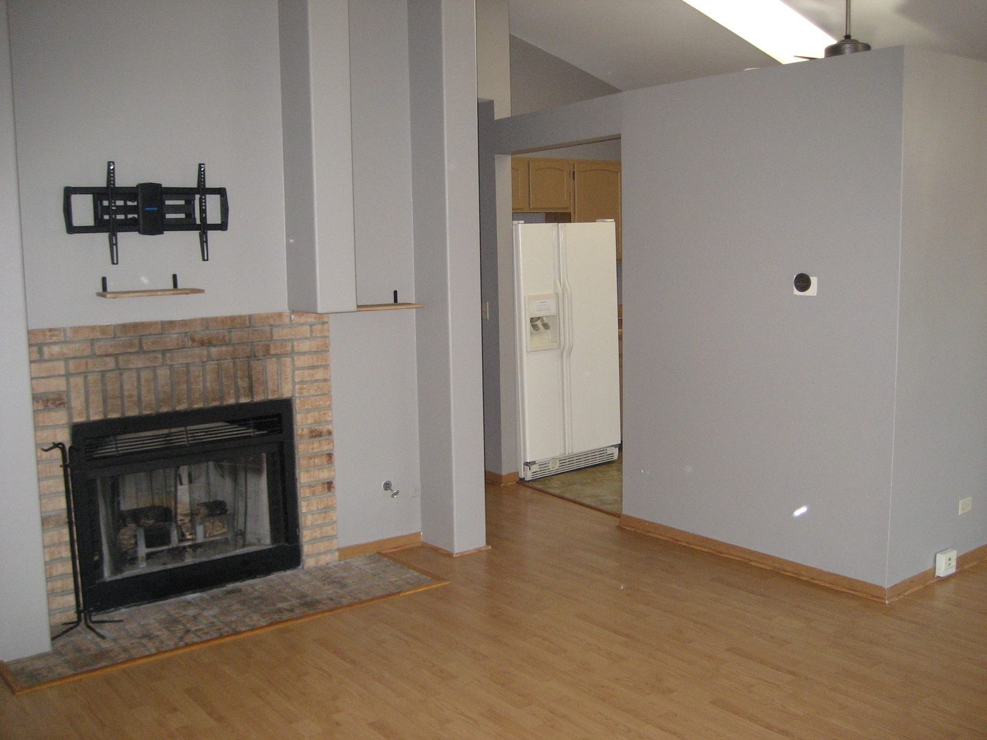 294 Le Parc Circle Buffalo Grove, IL 60089 - Photo 6 of 24 a view of an empty room with a fireplace