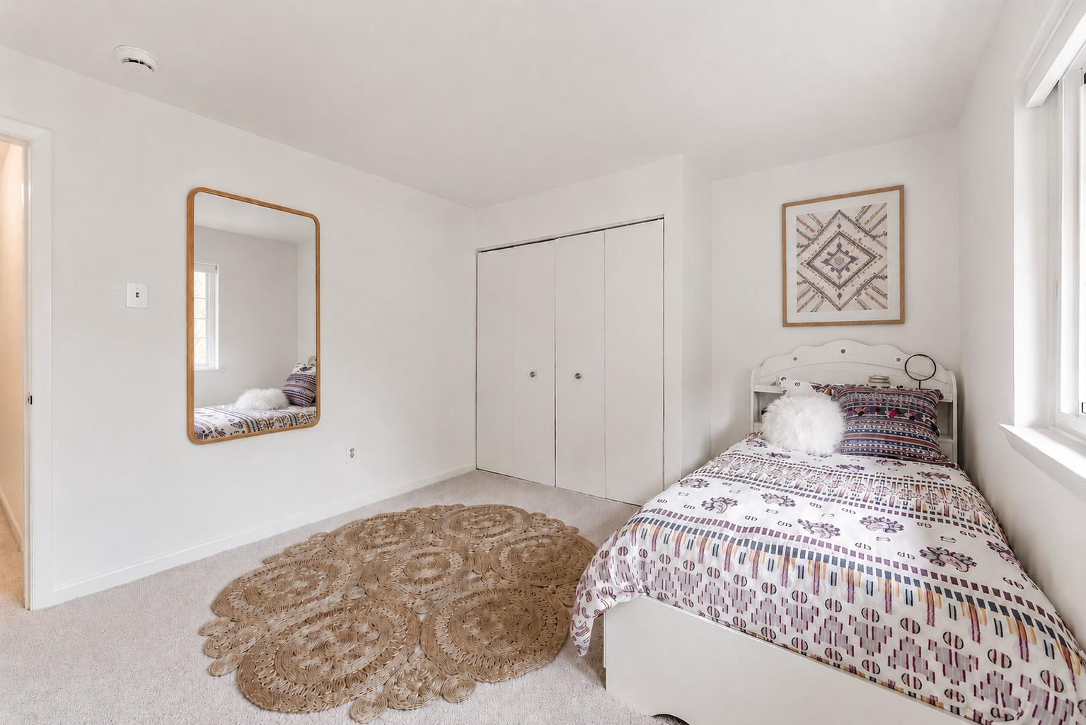 12023 Insha Court Reston, VA 20191 - Photo 43 of 52 a bedroom with a bed and a painting on the wall