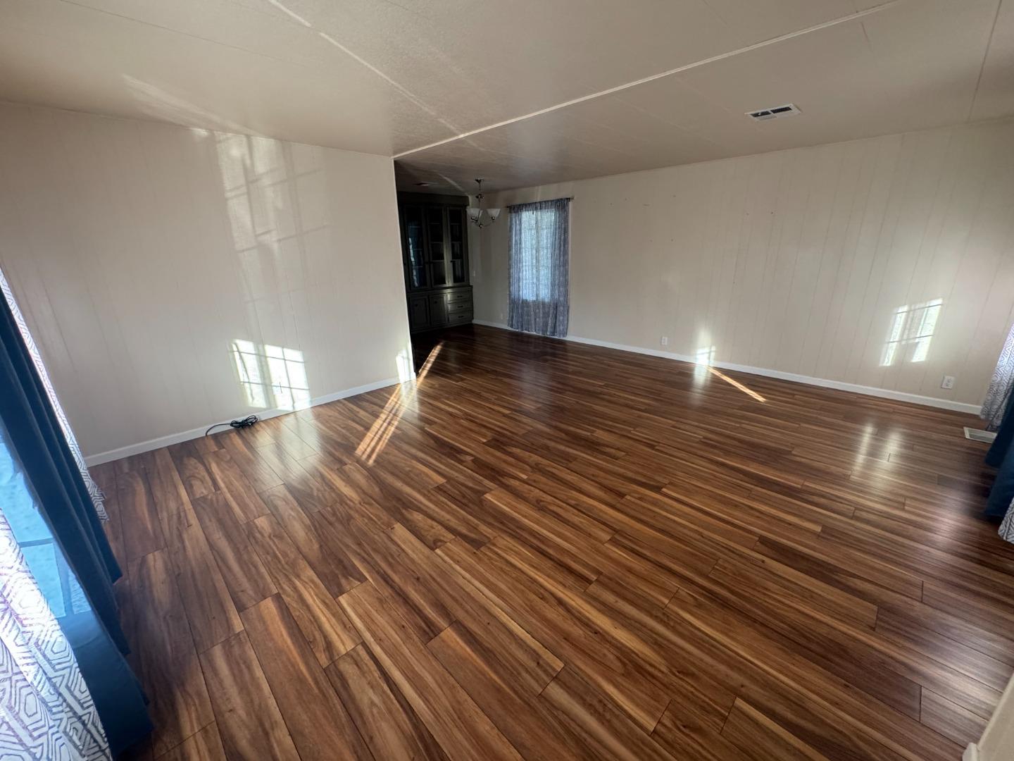 55 San Juan Grade Road, Unit 18 Salinas, CA 93906 - Photo 6 of 6 a view of empty room with wooden floor