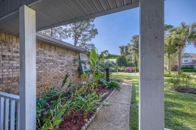 a view of a back yard of the house