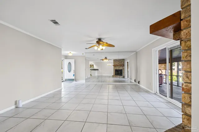 a view of an empty room and window