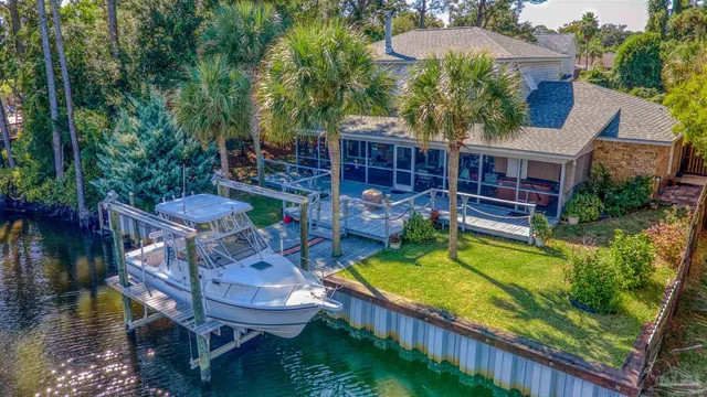 a view of a chairs and table in the terrace