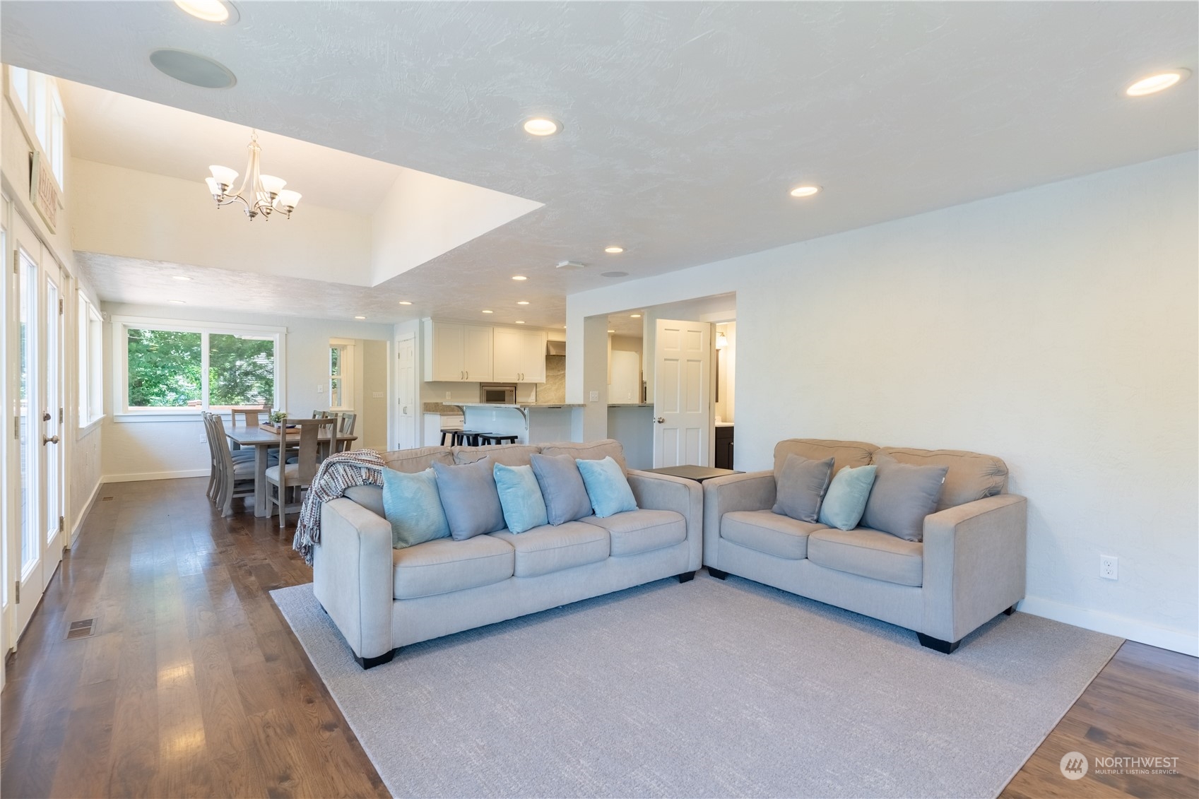 4110 Thornton Road Southeast Olympia, WA 98513 - Photo 11 of 40 a living room with furniture kitchen view and a large window