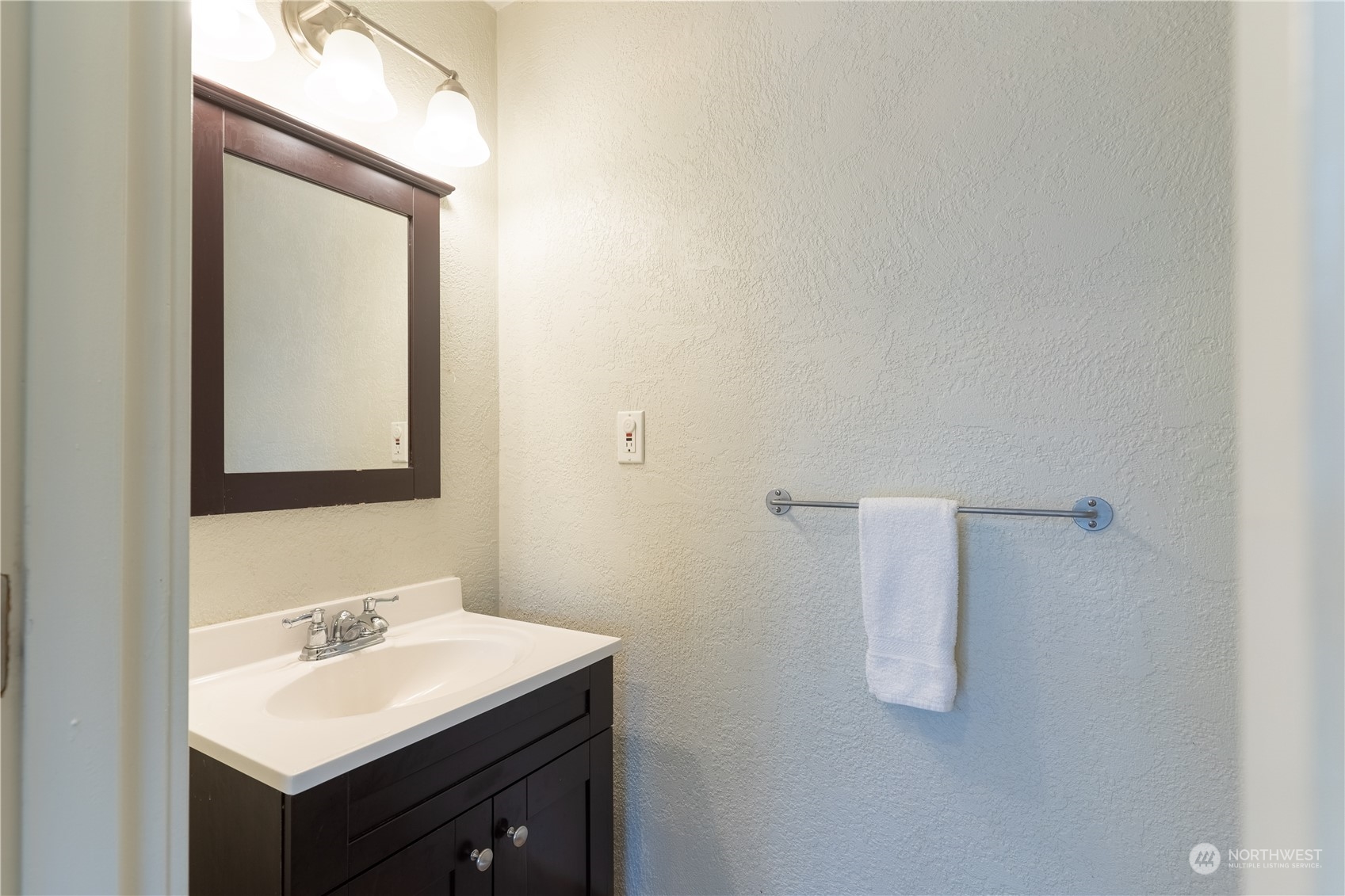 4110 Thornton Road Southeast Olympia, WA 98513 - Photo 12 of 40 a bathroom with a sink and a mirror