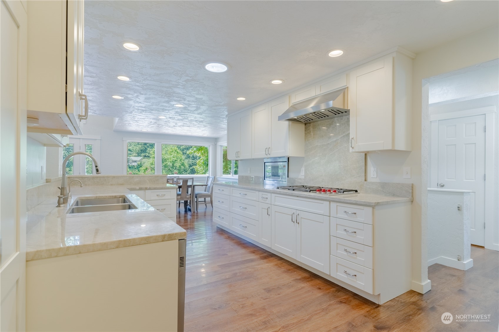4110 Thornton Road Southeast Olympia, WA 98513 - Photo 16 of 40 a kitchen with stainless steel appliances granite countertop a sink stove and refrigerator