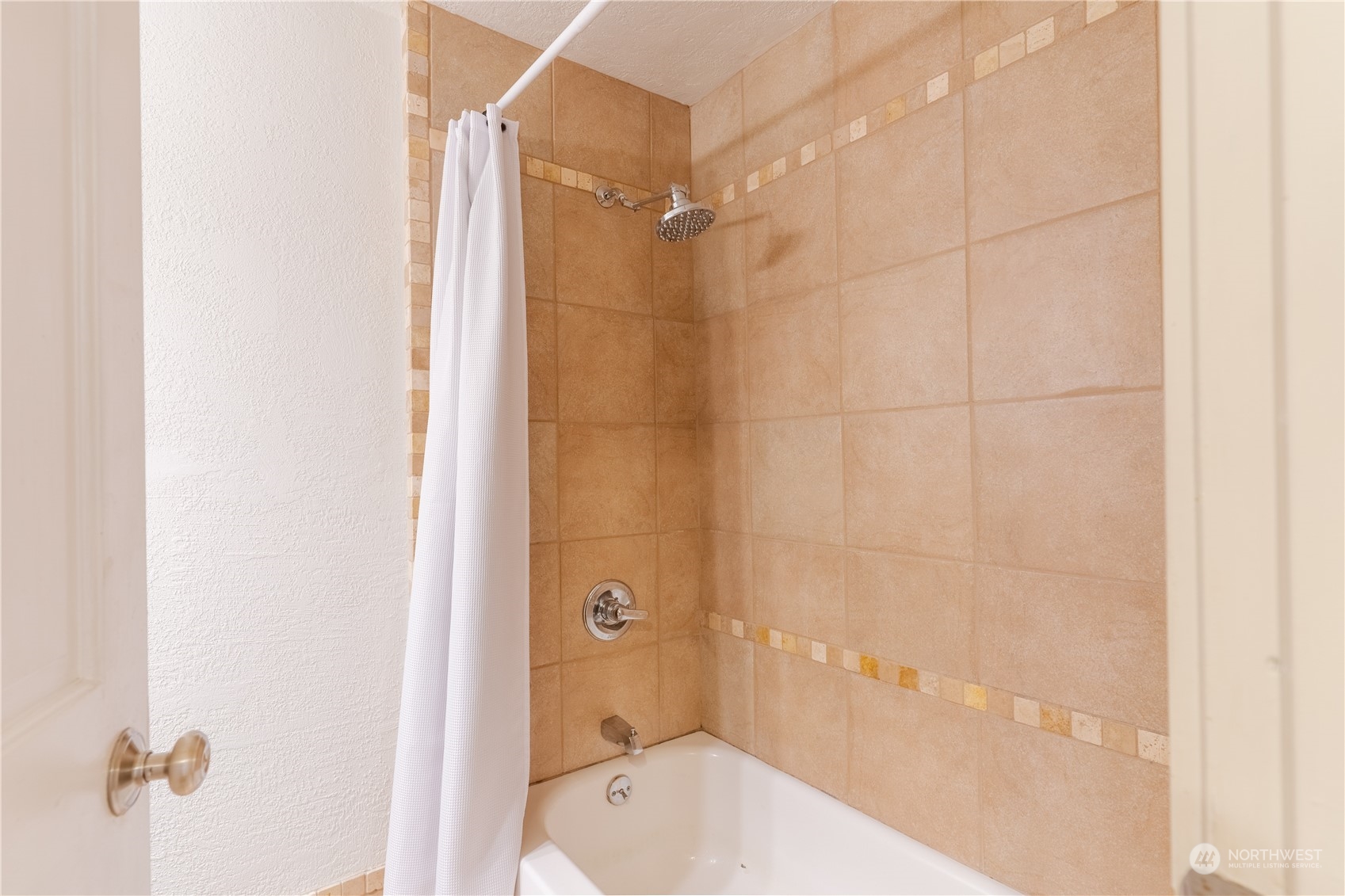 4110 Thornton Road Southeast Olympia, WA 98513 - Photo 22 of 40 a bathroom with a bathtub and shower