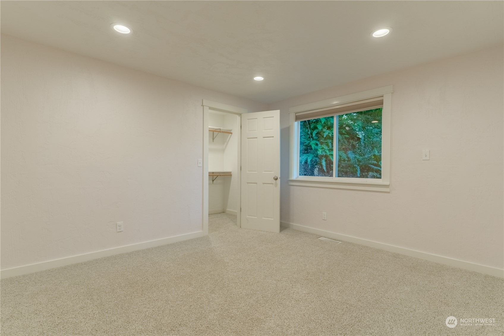 4110 Thornton Road Southeast Olympia, WA 98513 - Photo 24 of 40 an empty room with windows and closet