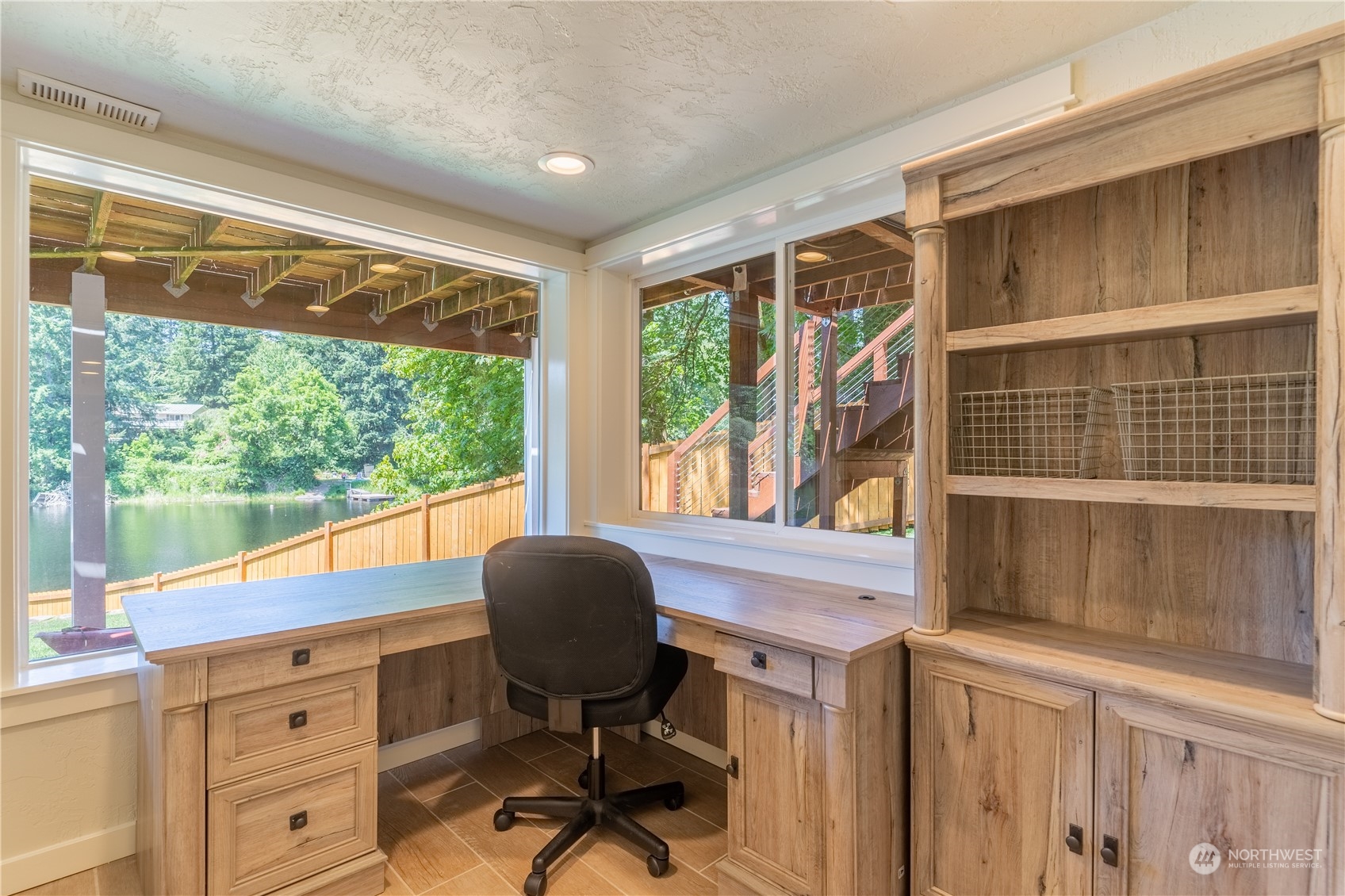 4110 Thornton Road Southeast Olympia, WA 98513 - Photo 27 of 40 a view of workspace with wooden floor and windows