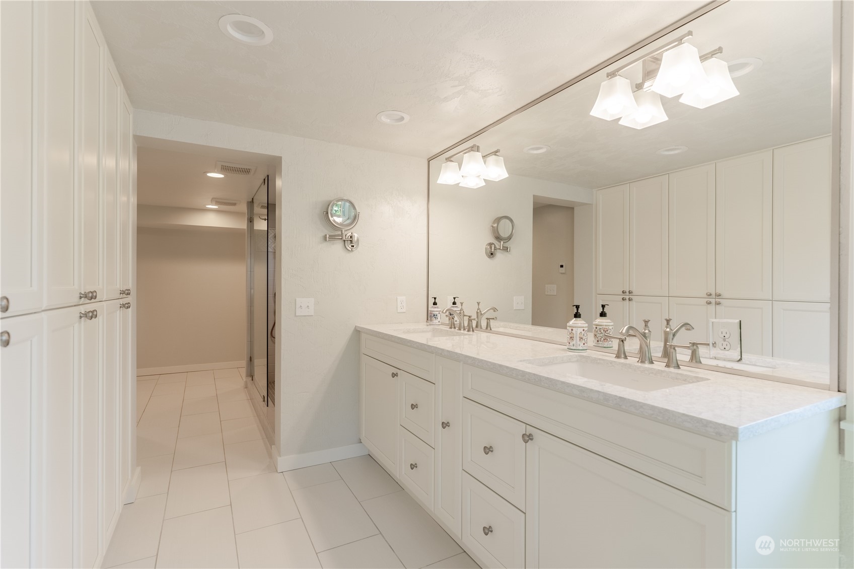 4110 Thornton Road Southeast Olympia, WA 98513 - Photo 31 of 40 a bathroom with a double vanity sink mirror and double