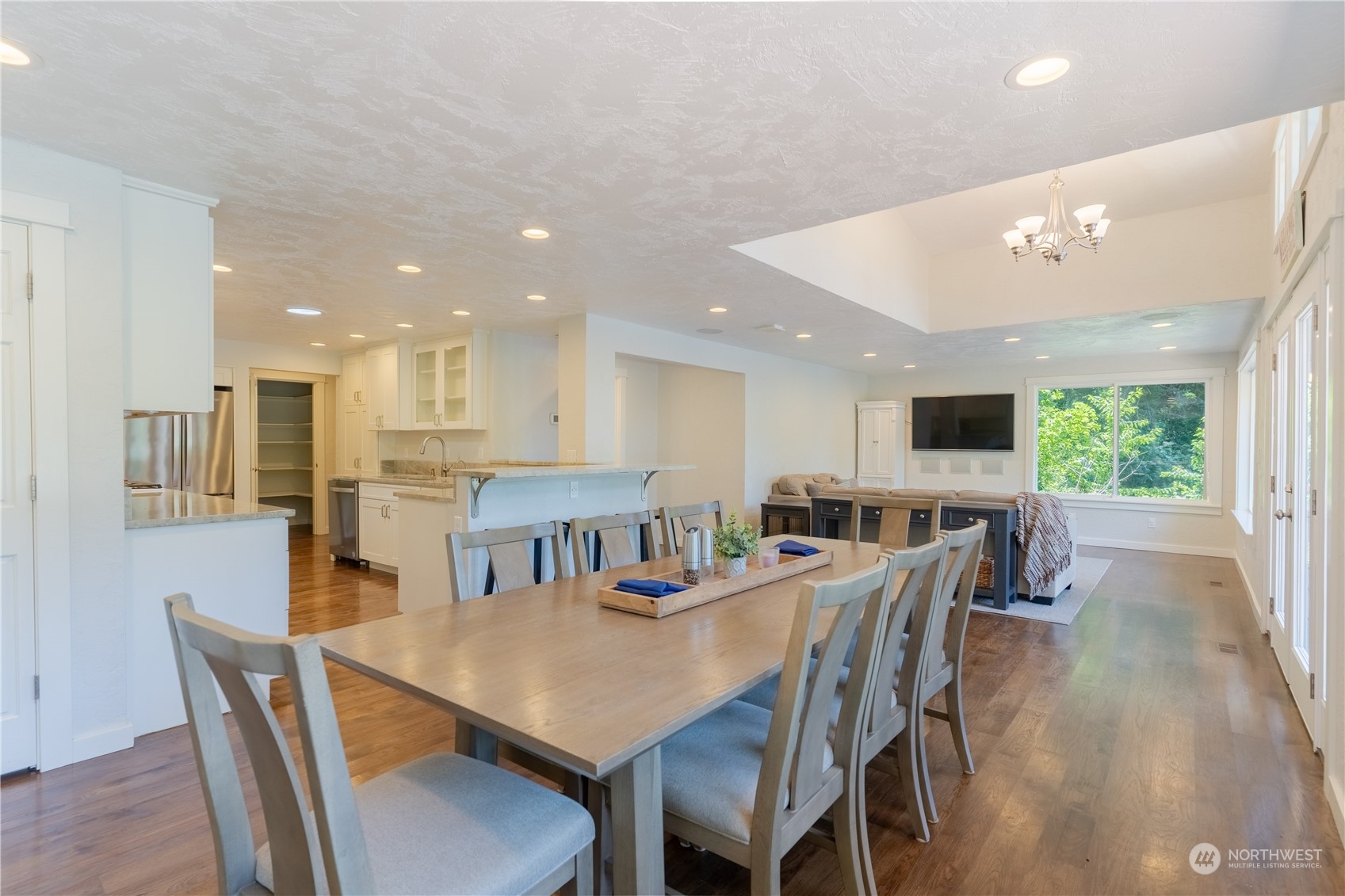 4110 Thornton Road Southeast Olympia, WA 98513 - Photo 6 of 40 a view of a dining area with furniture and a potted plant