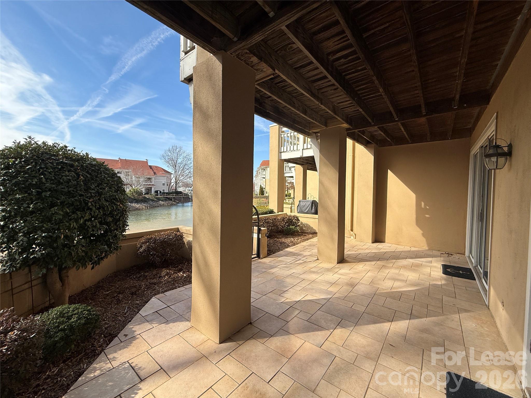 18009 Kings Point Drive, Unit M Cornelius, NC 28031 - Photo 25 of 34 a view of a porch