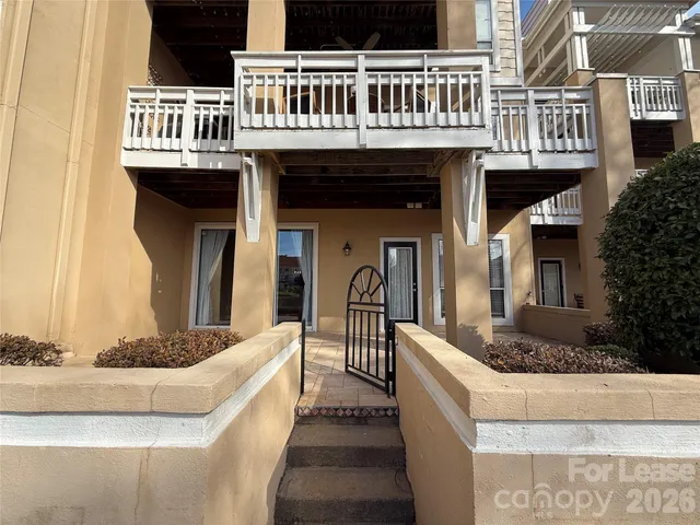a front view of a house with glass windows