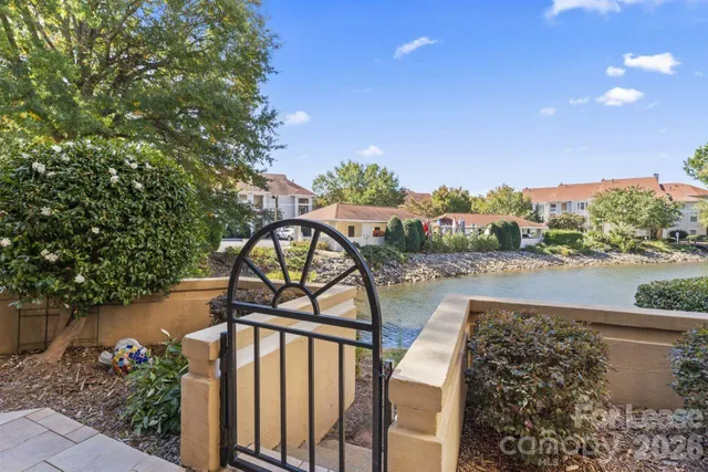 a view of a balcony with wooden floor
