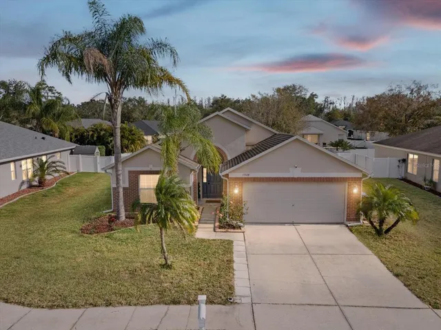 a house view with a garden space