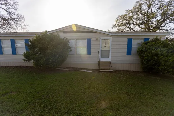 front view of house with a yard