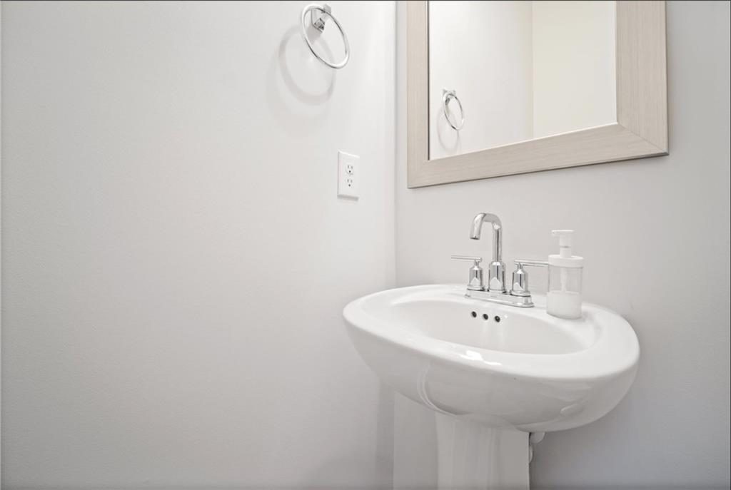 1595 Ridgebrook Downs Mableton, GA 30126 - Photo 14 of 39 a bathroom with a sink and a mirror