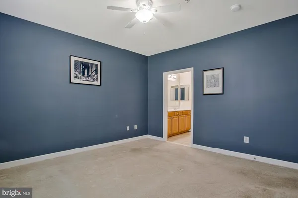 a bathroom with a double vanity sink and mirror