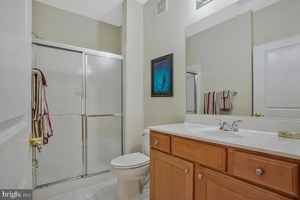 a view wooden floor with washer and dryer