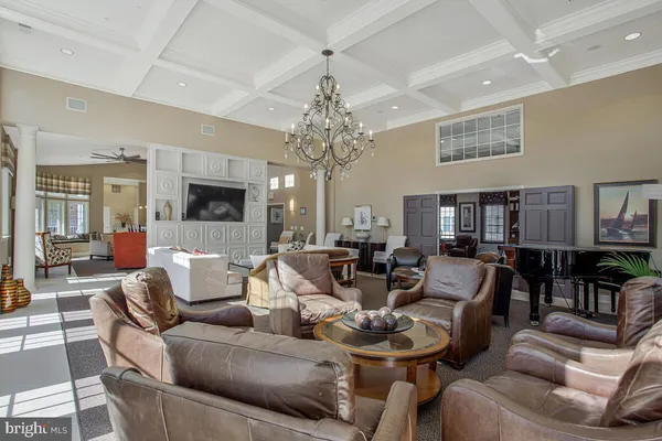 a view of a patio with a table and chairs