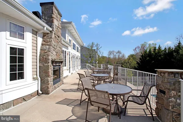 a room with furniture and pool table