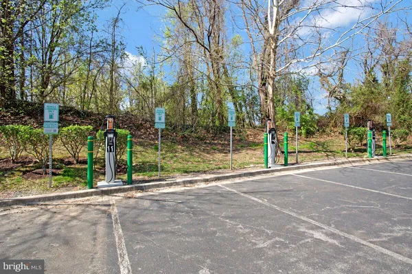 a view of a street with a building in the background