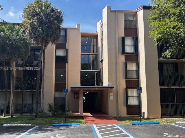 a view of a building with a street