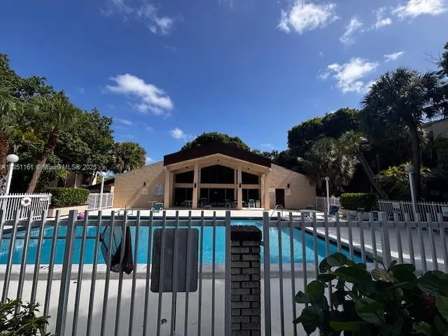 a house with trees in front of it