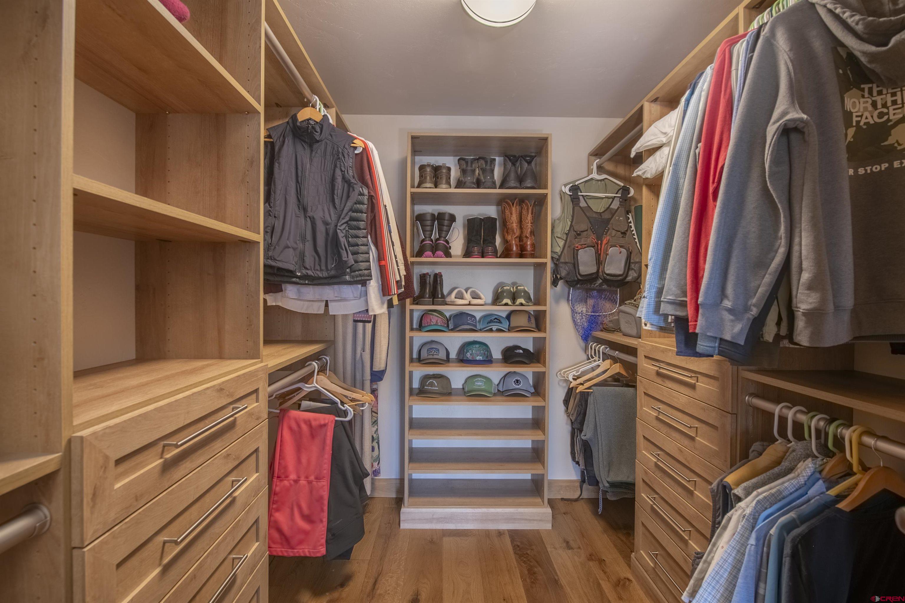14 Hunter Hill Road, Unit C202 Crested Butte, CO 81225 - Photo 16 of 35 a view of walk in closet with clothes and shoes