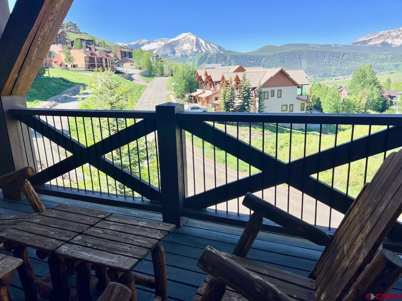 14 Hunter Hill Road, Unit C202 Crested Butte, CO 81225 - Photo 26 of 35 a view of a city from a balcony