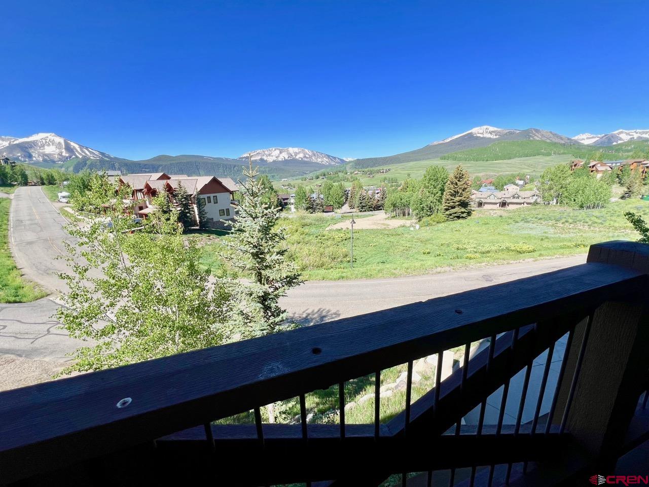 14 Hunter Hill Road, Unit C202 Crested Butte, CO 81225 - Photo 27 of 35 a view of a city from a balcony