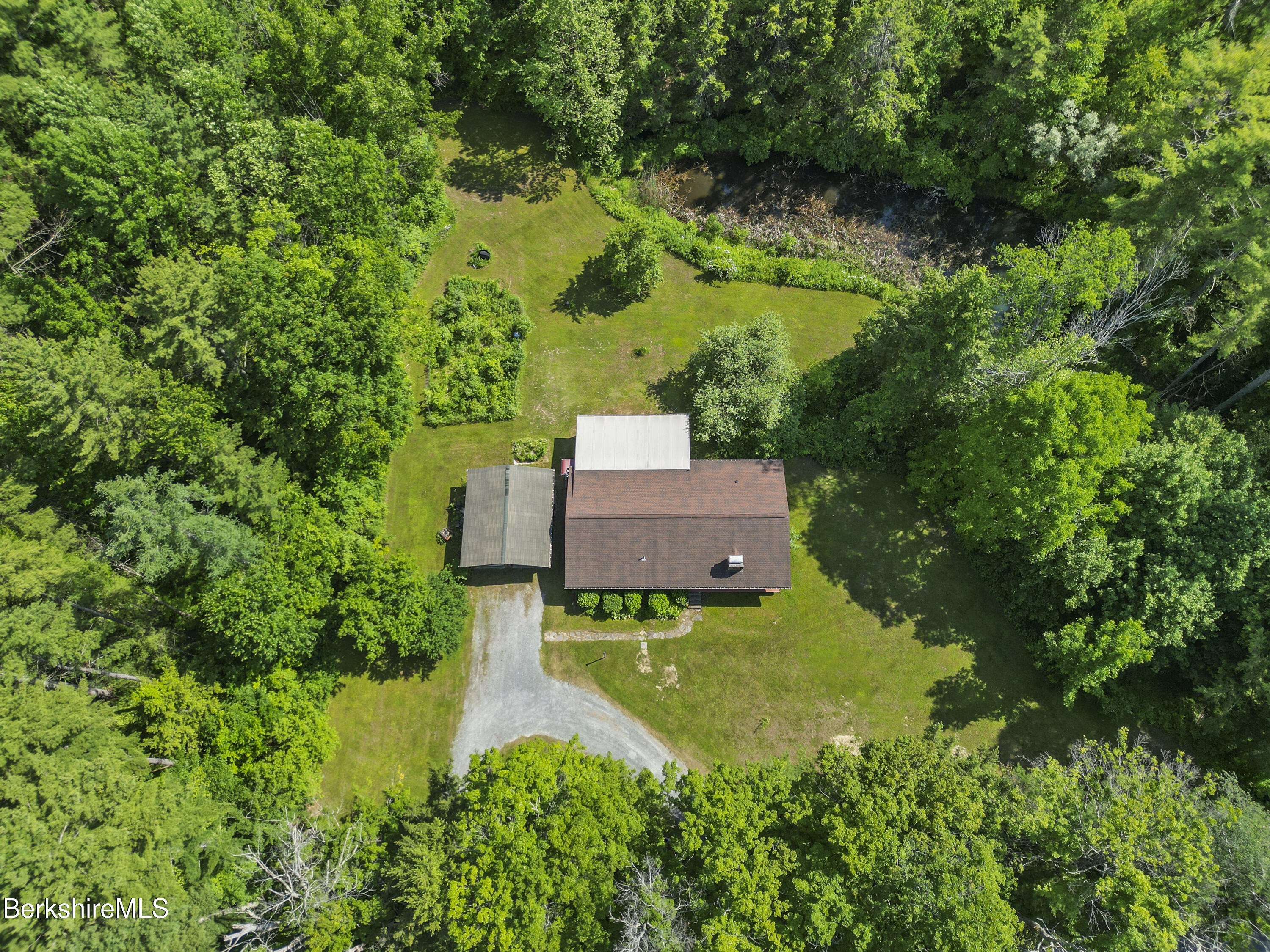 240 Kirchner Road Dalton, MA 01226 - Photo 1 of 51 an aerial view of a house with a yard