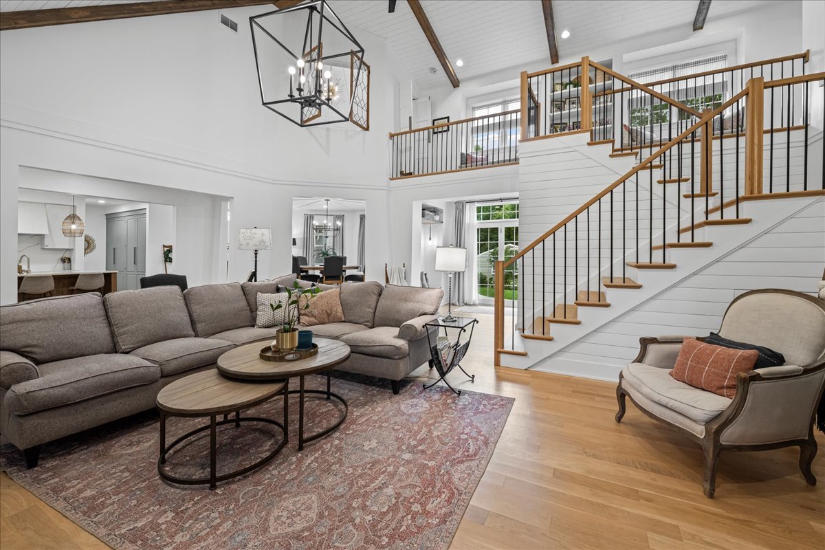 204 Country Commons Road Trout Valley, IL 60013 - Photo 11 of 58 a living room with furniture or couch and a chandelier