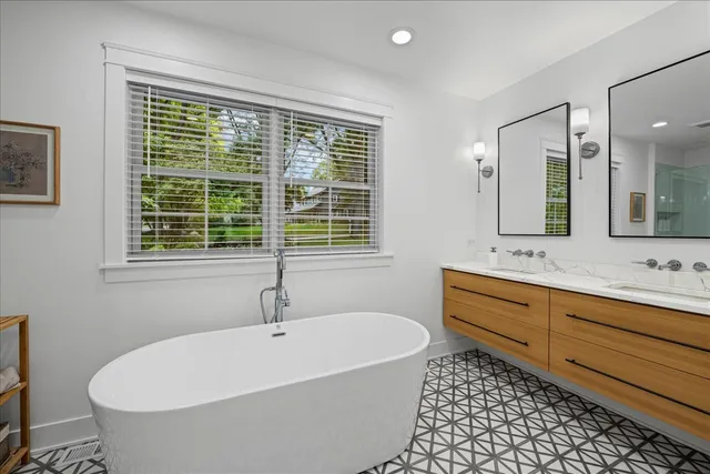 a view of a livingroom with furniture and a grill
