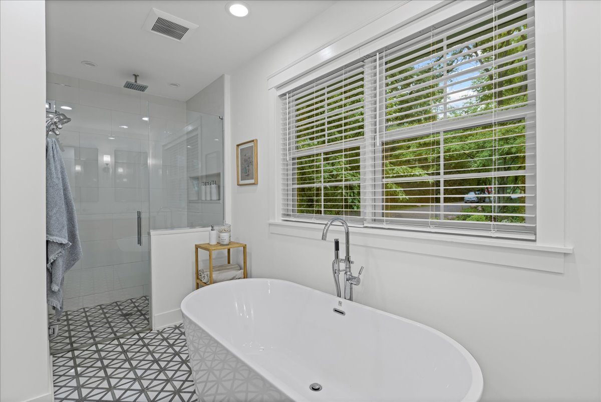 204 Country Commons Road Trout Valley, IL 60013 - Photo 20 of 58 a bathroom with a bathtub and a shower