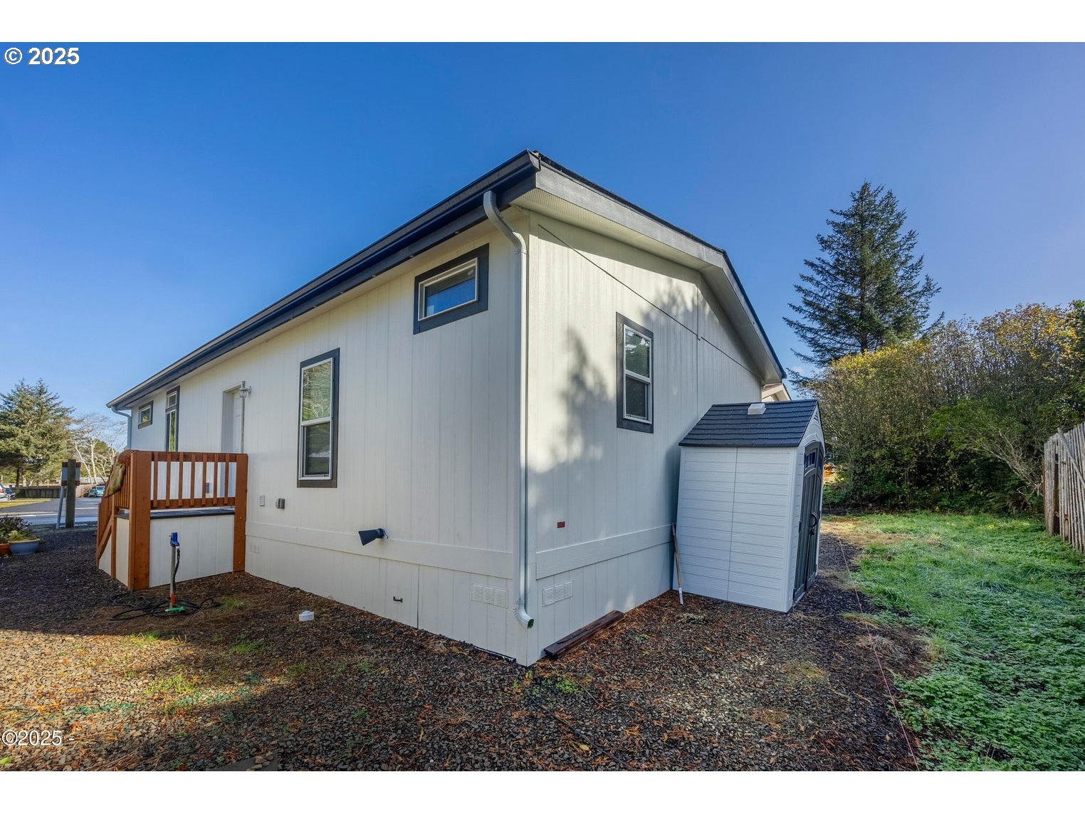 4875 Highway 101, Unit 3 Depoe Bay, OR 97341 - Photo 21 of 26 a view of a house with backyard
