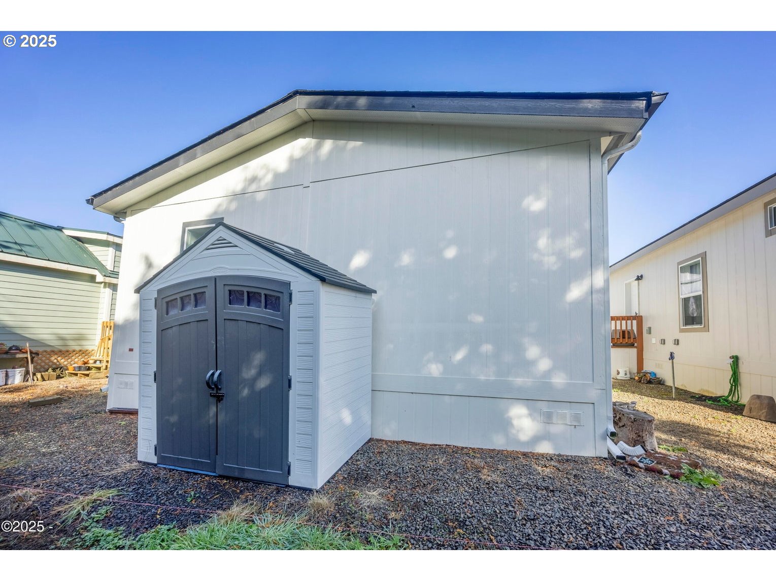 4875 Highway 101, Unit 3 Depoe Bay, OR 97341 - Photo 22 of 26 a view of a wooden door
