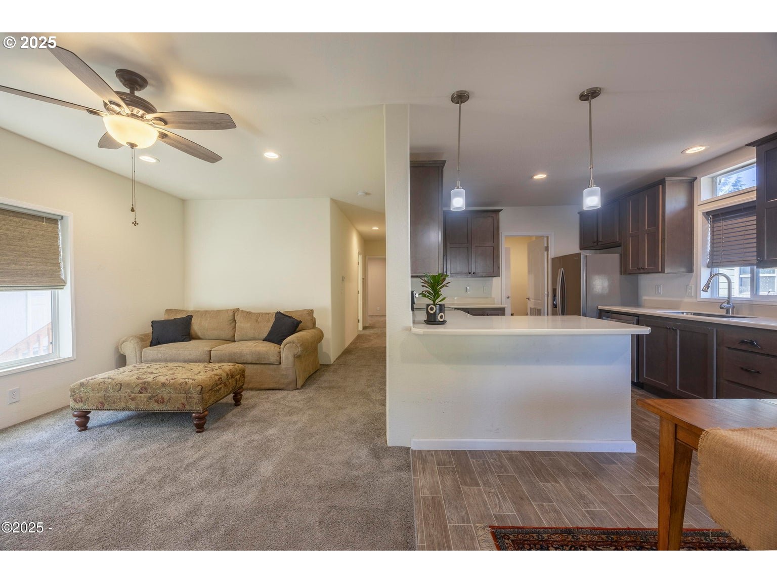 4875 Highway 101, Unit 3 Depoe Bay, OR 97341 - Photo 5 of 26 a living room with furniture and kitchen view