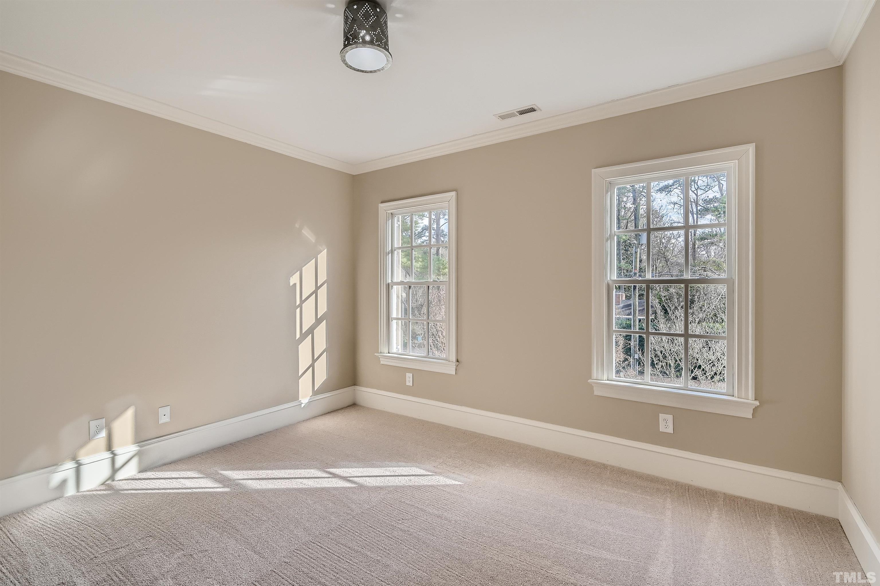 2714 Rosedale Avenue Raleigh, NC 27607 - Photo 18 of 28 a view of an empty room with a window