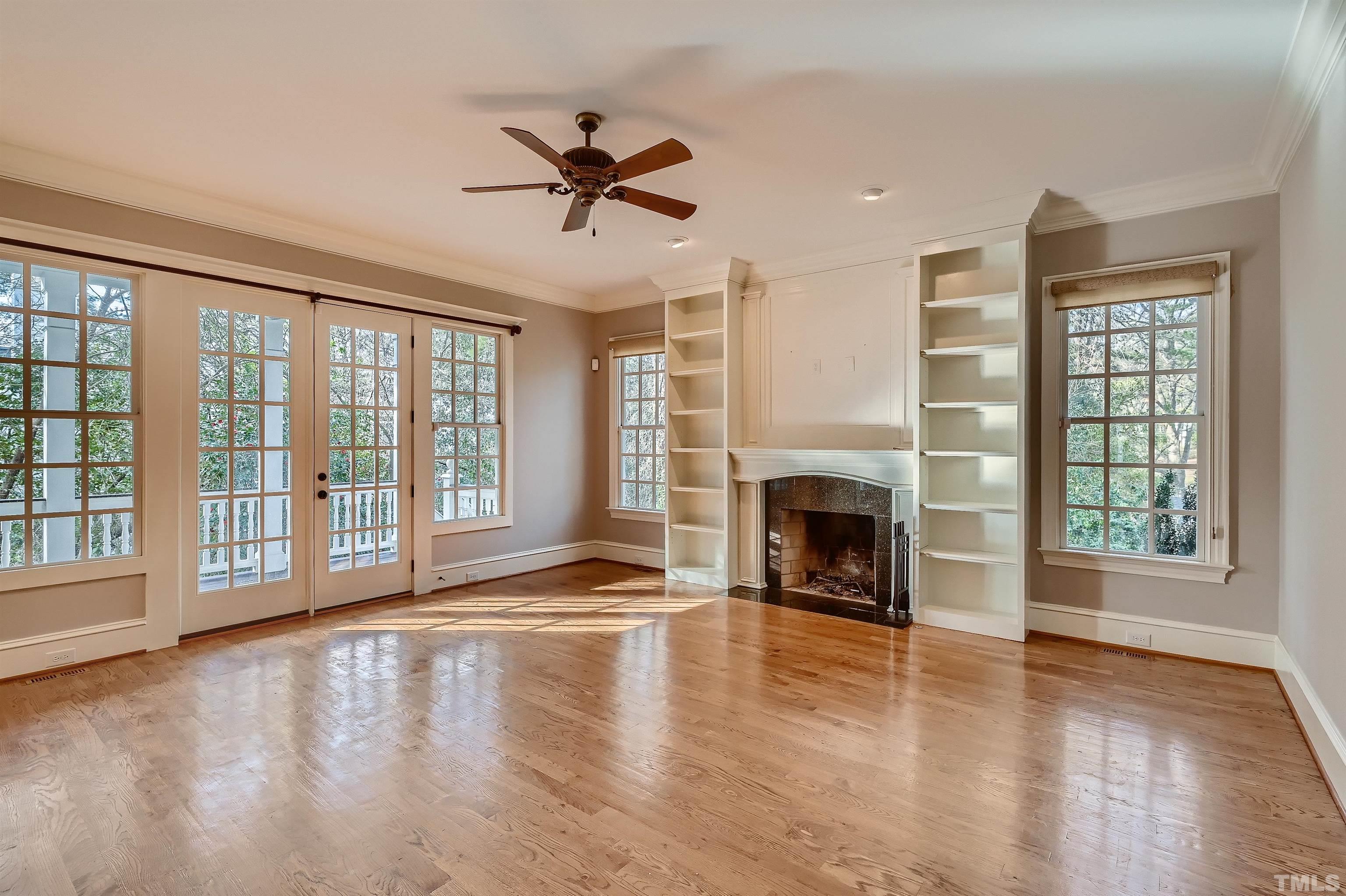 2714 Rosedale Avenue Raleigh, NC 27607 - Photo 5 of 28 a view of an empty room with window and fire place